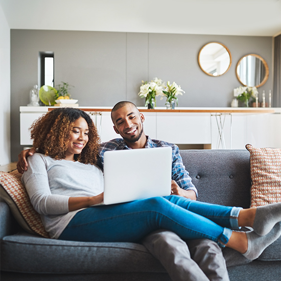 couple looking at laptop